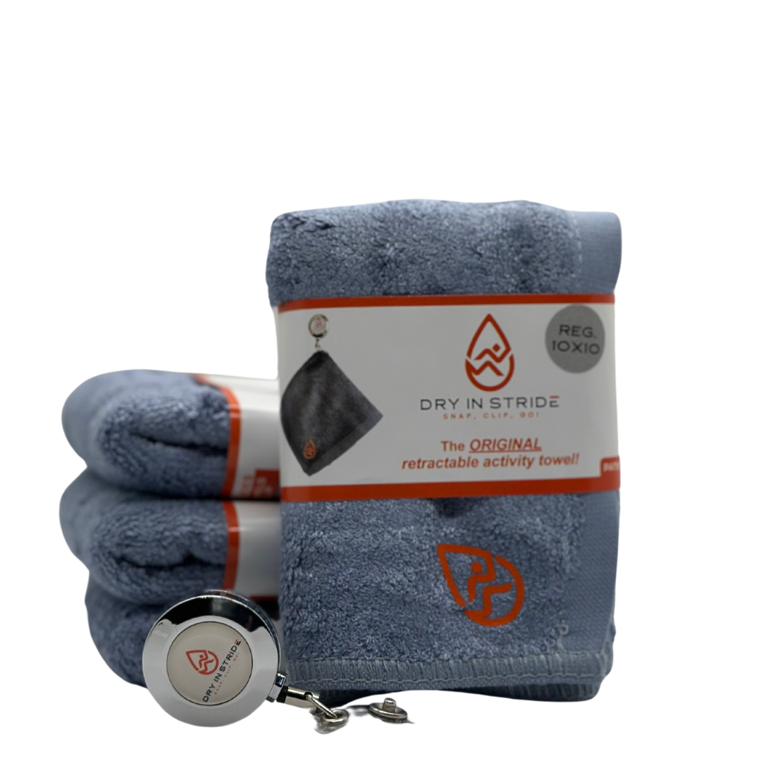 Dry in Stride regular towel set in color denim blue with clip showing. 